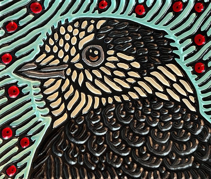 wood carving of a Grey Jay by Canadian artist Lisa Brawn