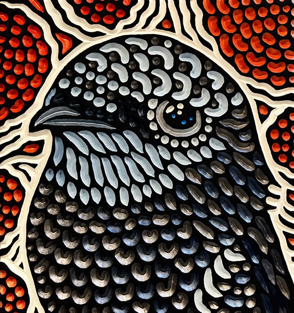 painted wood carving of a Swift by Canadian artist Lisa Brawn