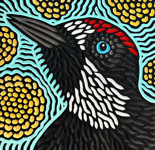 painted wood carving of an Acorn Woodpecker by Canadian artist Lisa Brawn