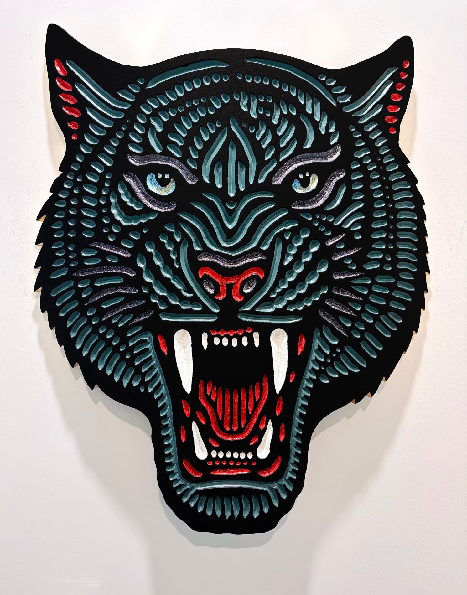 hand carved roaring blue tiger mask by artist Lisa Brawn