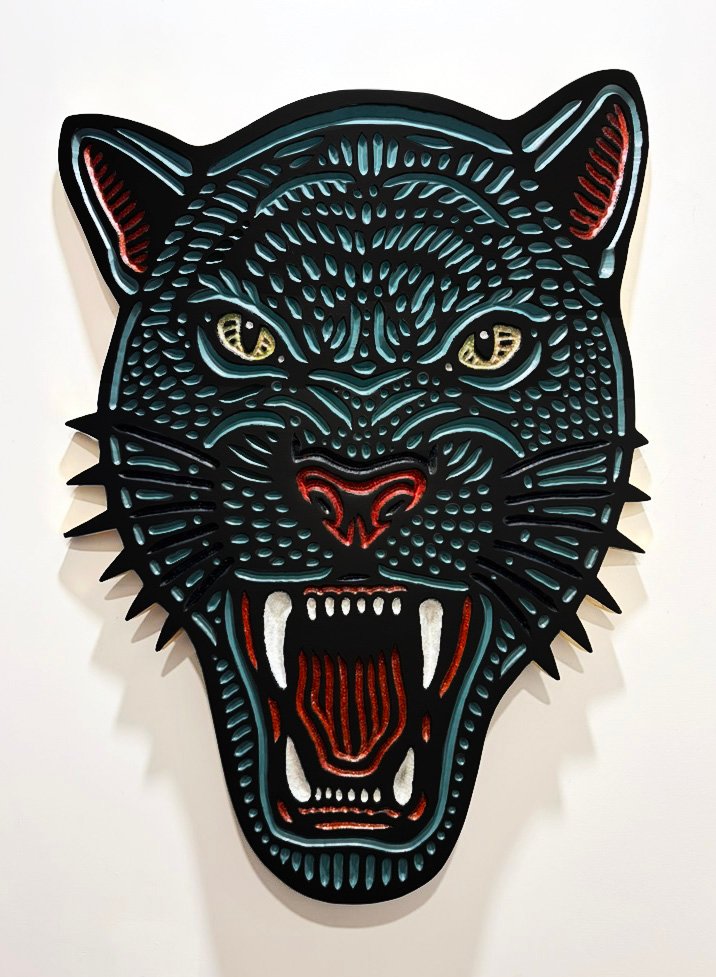 hand carved painted blue panther mask by Canadian artist Lisa Brawn